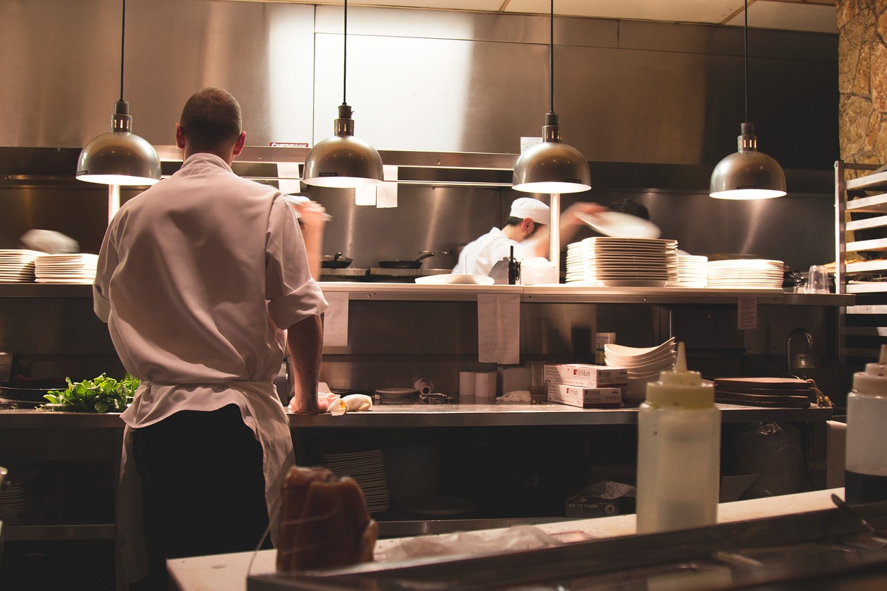 Professional kitchen operations with chefs at work