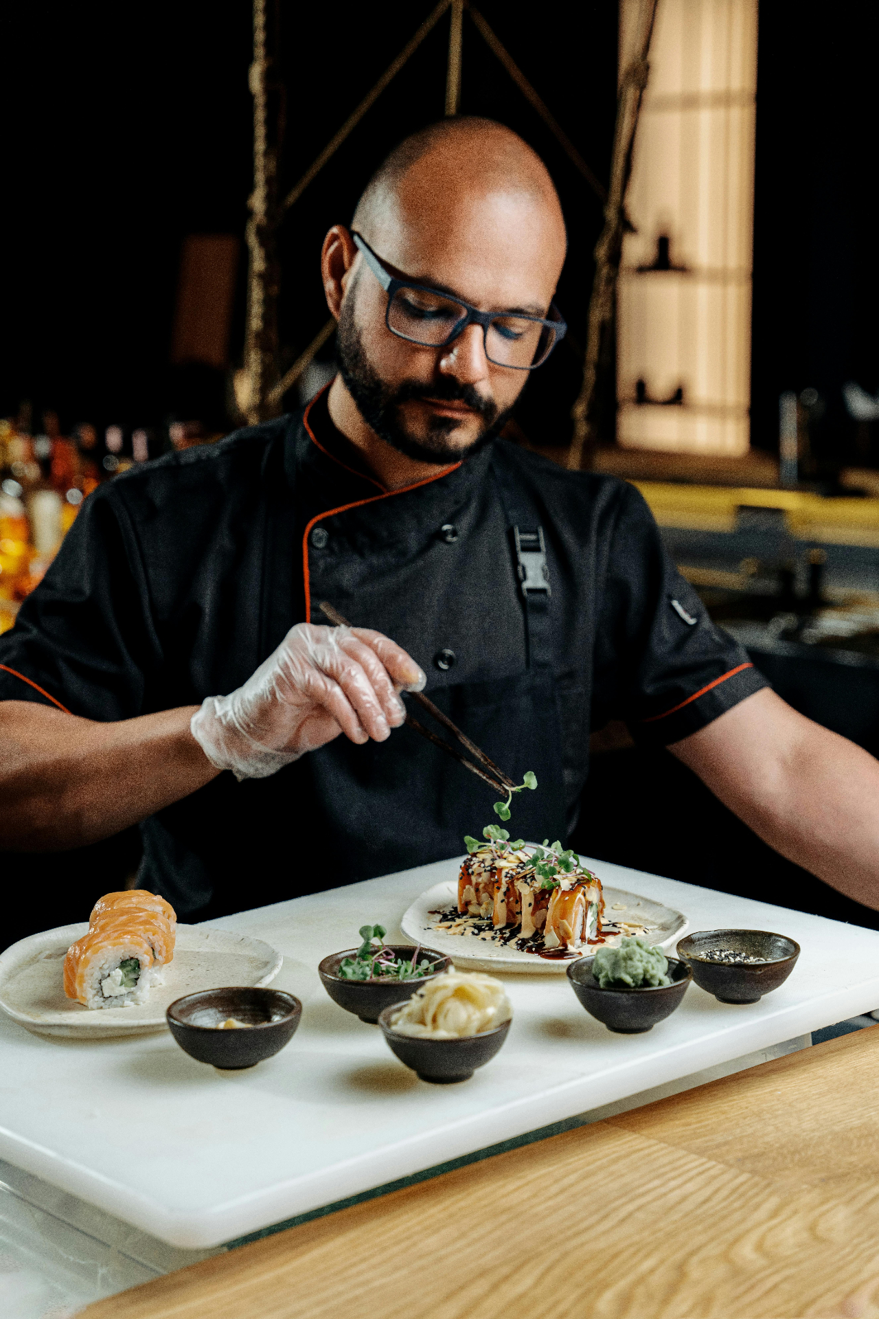 Chef carefully plating a dish